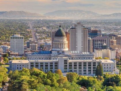 The Salt Lake City skyline on a Summer day with trees in the foreground